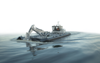 A modern cutterhead dredge operating in clear water, highlighting advanced technology and efficient water management for rental projects.