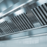 Clean and polished commercial kitchen exhaust hood after professional cleaning