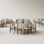 Elegant indoor party setup with banquet chairs and tables in a stylish event hall